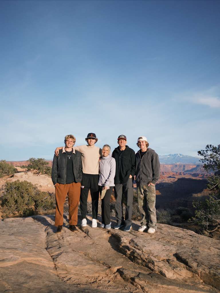 Brett Fish and his family on a canyon overlook out west